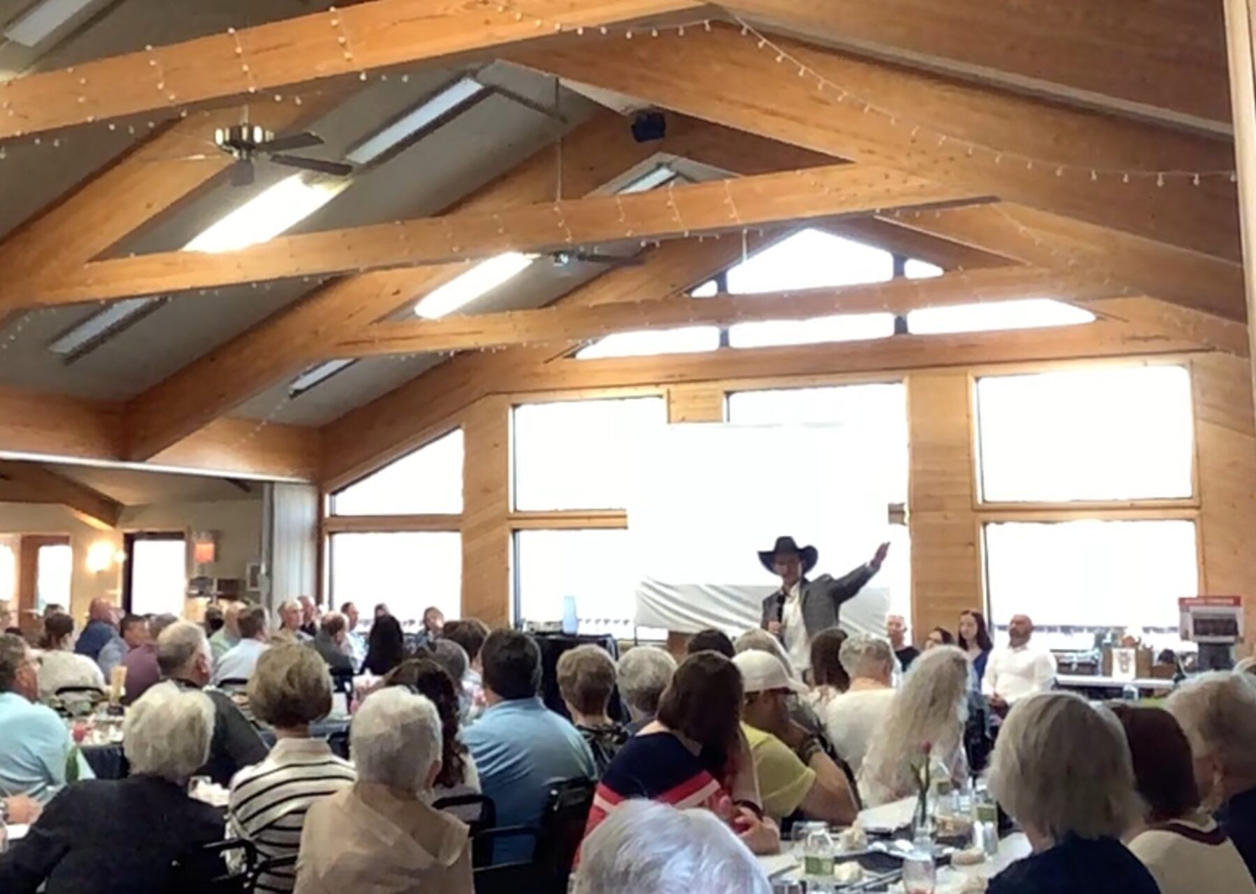 Jon Anderson leading a workshop for a full room